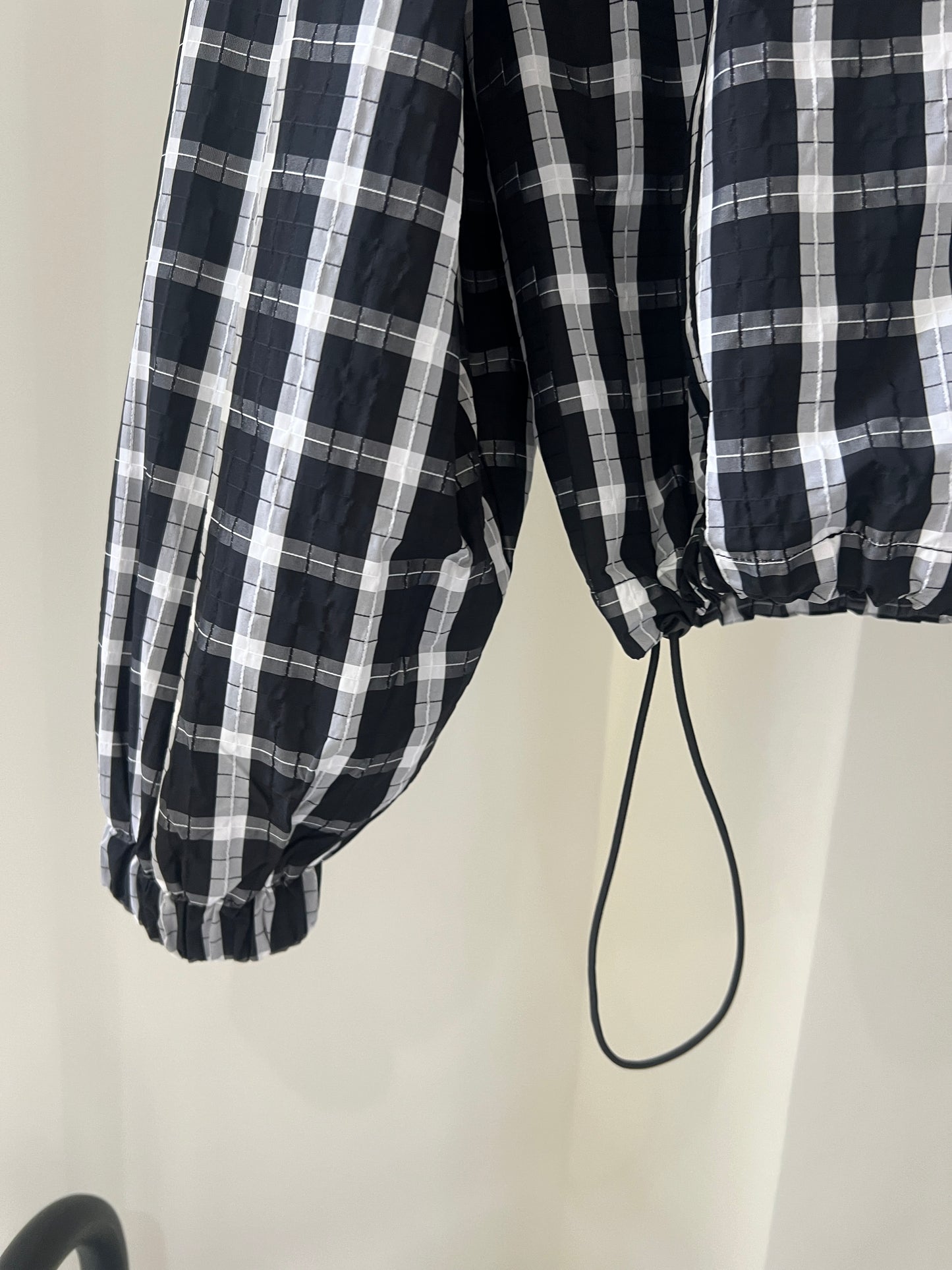Plaid bubble zip top
